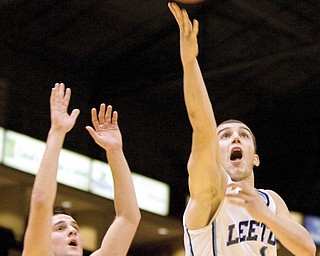 Leetonia's Josh Selway shoots for net past Lowellville's Mike Basista at the the Chevy Centre during a matchup Wednesday evening. Selway went on to score two with the shot.