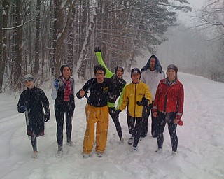 In Mill Creek Park after a Saturday morning six mile run, pictured
from left to right; Tim Nichols, Jaclyn Nichols, Jon Bolha, Melissa Jones,
Jen Zocolo, D.J. Kostic and Chloe Zocolo.