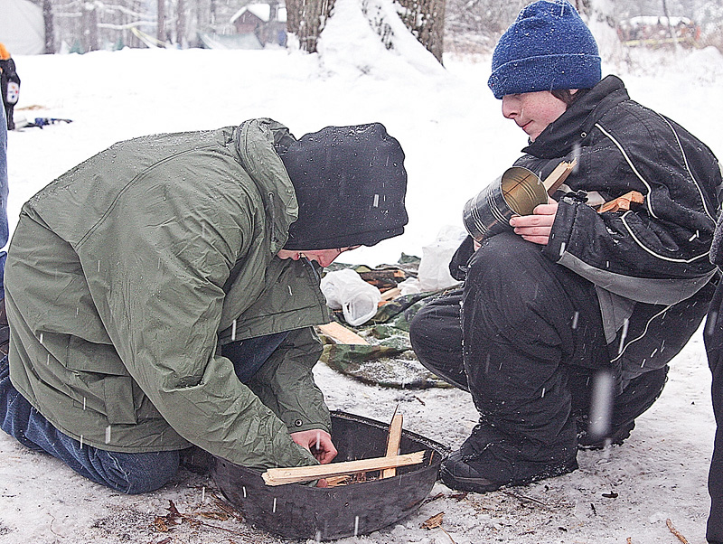 BOY SCOUT - (L) Joe L. and Josh D. try to start a fire Saturday afternoon. 