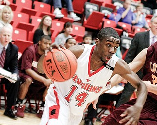 YSU's Kelvin Bright (14) drives the ball hard through Loyola's Justin Cerasoli (24) Saturday January 10, 2009