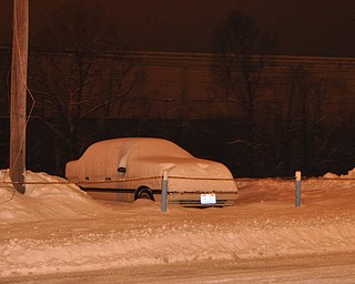 A car in a downtown Youngstown parking lot.