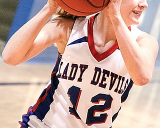 Lady Devil Matti Shahaden (12) looks to pass the ball,