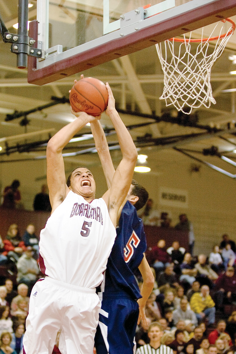 Boardman's Chase Hammond attempted block by Fitch's John Williams
