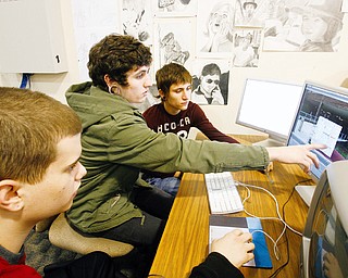 MUSIC VIDEO: Students at the Mahoning County Career and Technical Center teamed up with Prodigal Media Co. to make a music video that can be found on YouTube. Some of those who worked on the video are, from left, Anthony Montemarano of Boardman, T.J. Lindquist of South Range and Shawn Dorman of Jackson-Milton.