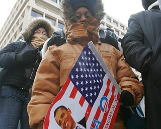 Rashaan Nelson, 8, of Y-town with an Obama poster during the inaugural events