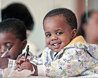 Donald Price (3) with his brother Dontrell Wilson (1) at the 3rd annual City-Wide baby shower at McGuffey Center,