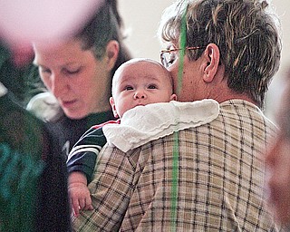 Mary Hamrock of Austintown holds her grandson Jon-Paul Fusco (2.5 months) as they attend the 3rd annual City-Wide baby shower at McGuffey Center