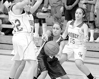 Ursuline's Lucia Petrus (3) struggles to pass the ball while being triple teamed by Mooney's Dominique Zordich (22), Katie Hughes (13), and Angela Stana (15) during the second quarter at Cardinal Mooney High School in Youngstown.