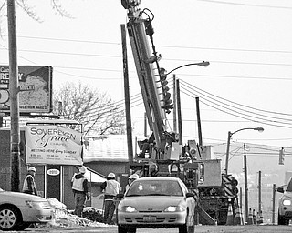 The road between Belle Vista and Millet avenues on the city's West Side was closed after a traffic accident at the 2000 block of Mahoning Avenue at 8:35 a.m. Friday. The accident caused downed power line wires to fall onto the road after a utility pole was struck, police said. Traffic was tied up for a couple of hours while Ohio Edison crews worked to replace the pole and wires.