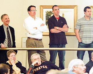 Watching the Glory days -Lou Zona with the Butler - Don Long - Pirates Hitting Coach - Jeff Carstans and Neil Walker watch as a replay of the Orioles and Pirates play in the world series - the Pirates won
