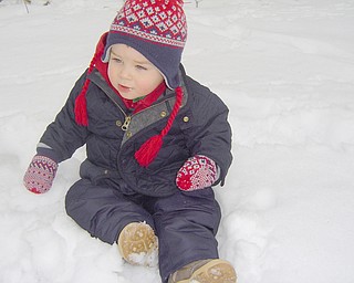 Frankie Rizzi, poses in the snow for his mom, Molly of Poland.