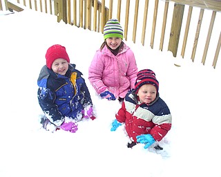 Jessica Crouse and snaps daughter Hannah and sons JD and Heath playing in the snow.