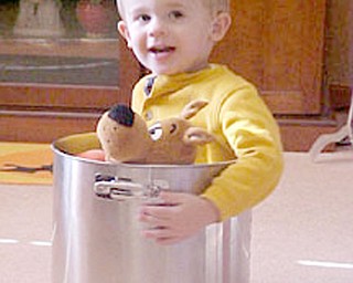 PJ and Scooby-Doo offer a not-so-suble hint to PJ's parents, Michelle and Pat Gaia of Canfield, to get that Italian wedding soup on so he can enjoy one of his favorite wintry-day dishes.
