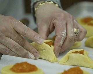 all done by hand  as the church makes Hamentaschen cookies for Purim- robertkyosay