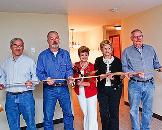 RIBBON CUTTTTING - Tom Christoff - Ken Leonard - Bev Flowers - Jan MagLaughlin - Joe Clark - cut the ribbon at Canfield Colonial Estates.