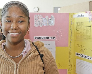 Hayes 8th grader Carmella Oliver (14) displayed her project at the Youngstown City Schools All-City Science Fair at East High School, Saturday February 7, 2009