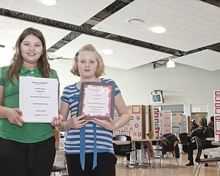 McGuffey 5th Graders Tabatha West (11) and Kaitlyn Geisel (11) displayed her project at the Youngstown City Schools All-City Science Fair at East High School, Saturday February 7, 2009