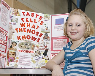 McGuffey 5th Grader Kaitlyn Geisel (11) displayed her project at the Youngstown City Schools All-City Science Fair at East High School, Saturday February 7, 2009