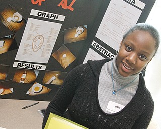 Toshi Hudson, an 8th grader from Hayes Middle School displayed her project at the Youngstown City Schools All-City Science Fair at East High School, Saturday February 7, 2009