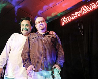 Funny Farm Comedy Club Entertainment Director Eric Stevens and Proprietor Chris Jackson on stage