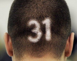 Poland freshman basketball player Mitch Dinopoulos who is undergoing chemotherapy and radiation treatments was honored during " Mitch Night" at the Feb. 13, 2009 Poland vs Beaver Local basketball game.