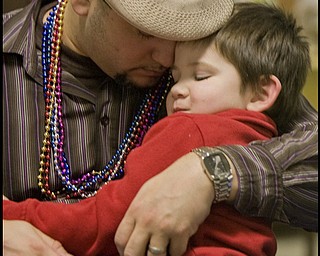 2.24.2009
Miguel Cuevas and his son Jayden, 3, both residents of Lowelville, pray during a Mardi Gras celebration at Faith Community Church on Midlothian Ave in Youngstown, Ohio Feb. 24, 2009.
Geoffrey Hauschild