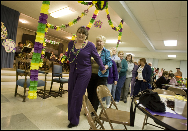 2.24.2009
Sharyle Marcy leads a dance line during a Mardi Gras celebration at Faith Community Church, where Marcy's husband is acting pastor, on Midlothian Ave in Youngstown, Ohio Feb. 24, 2009.
Geoffrey Hauschild