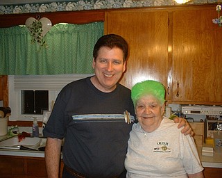 HAIR TODAY: Florence Dailey of Youngstown is pictured with her son, Michael Dailey, on St. Patrick's Day in 2008. Florence always celebrates the holiday in style by coloring her hair green.