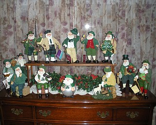 MERRY ST. PATRICK’S DAY? Florence Lloyd, who is 96, is getting ready to celebrate another St. Patrick’s Day with her display of Irish Santas, given to her as gifts from her children and grandchildren. This photo was taken by a grandniece, Cindy Reilley Dominic.