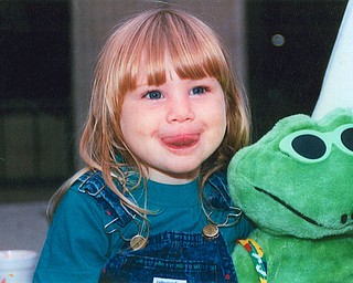 KERMIT AND FRIEND? Leanna Hartsough of Canfield was showing Grandma Lana VanAuker of Canfield her best frog face.