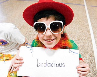 READ ACROSS AMERICA at DOBBINS SCHOOL IN POLAND - Michael Mastoris a 4th grader donned a hat and glasses to demonstrate BODACIOUS