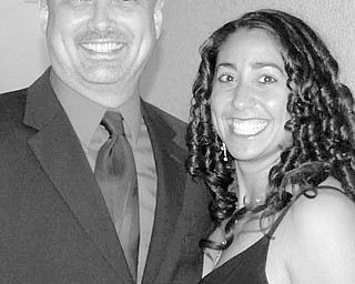 Robert J. Truslow and Justine M. Beshara