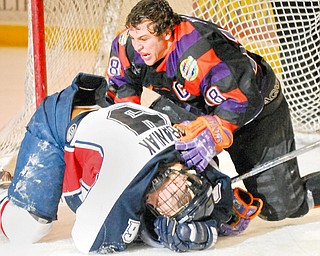 Mahoning Vally's #18  Johnny Meo is trying to start a fight with Traverse City's #6 Tyler Stephens, during the final seconds of Sundays game.