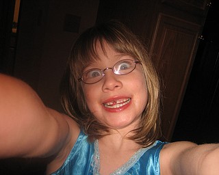 This is a self portrait by JACQUELINE KISH, daughter of Paul and Marty Kish of New Middletown, after successfully yanking out her first front tooth.