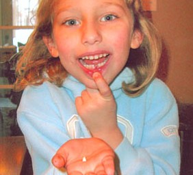 Jen Kadilak sent this picture of her daughter, KATE, age 6, showing off her first missing tooth. The family lives in Canfield.