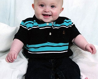 This happy little guy is 7-month-old JACK ARQUILLA, son of Dave and Mary Arquilla of Poland. His dad asks, “With a smile like this, who needs teeth?”