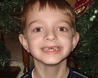 TREVOR OF BOARDMAN lost his two front teeth in time to sing “All I Want For Christmas Are My Two Front Teeth” in December 2007, when he was 9 years old.