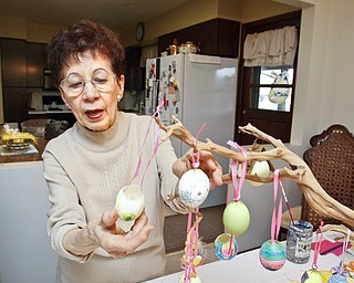 Marie Dippolito of Warren shows her egg tree in her home.