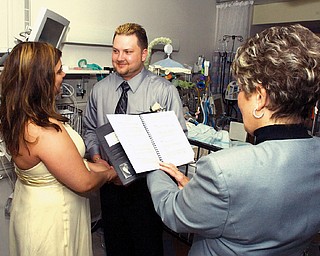 Melissa Kascask, 28, and husband Chadd Kascsak, 23. Chadd and Melissa were married at Akron Children’s Hospital Tuesday morning.