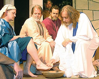Jesus played by Dennis Carpenter washes the feet of his apostles Saturday afternoon in Niles.