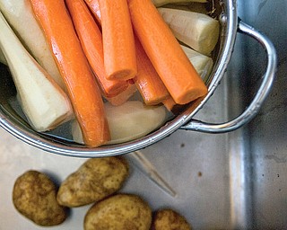 Potatoes, carrots, and parsnips for a use in a Passover meal at Ohev Tzekek Synagogue in Youngstown on Wednesday.