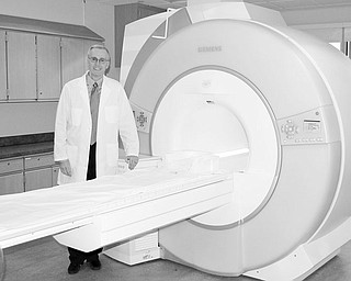 <p>Special to The Vindicator</p>
<p>PERFECT IMAGE: Sharon Regional Health System Auxiliary will donate proceeds from its Charity Ball to the Cardiac MRI/CT program at the Diagnostic and Imaging Center on Garden Way in Hermitage. Standing beside the MRI unit at the center is Dr. J. Ronald Mikolich, MRI/CT cardiology specialist. </p>