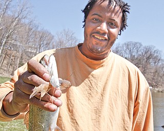Ohio Division of Wildlife releases 2500 Rainbow trout into Lake Glacier Thursday, April 9, 2009. Spectators and fisherman gather.