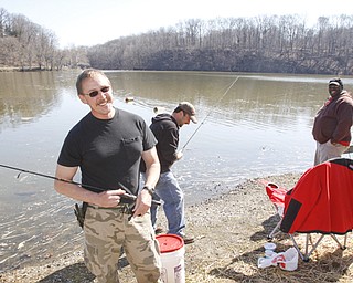 Ohio Division of Wildlife releases 2500 Rainbow trout into Lake Glacier Thursday, April 9, 2009. Spectators and fisherman gather.