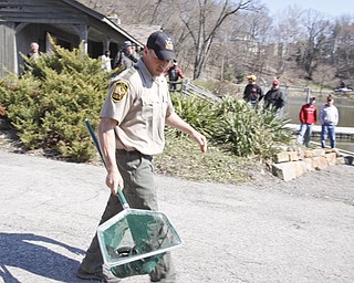 Ohio Division of Wildlife releases 2500 Rainbow trout into Lake Glacier Thursday, April 9, 2009. Spectators and fisherman gather.
