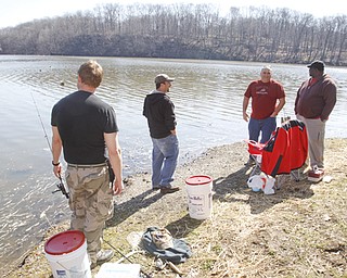 Ohio Division of Wildlife releases 2500 Rainbow trout into Lake Glacier Thursday, April 9, 2009. Spectators and fisherman gather.