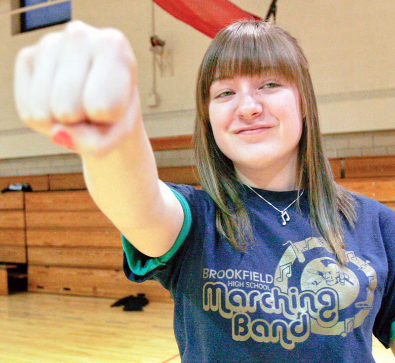 Abby Burton, 16, of Brookfield punches during  a self defense course for females ages 16-18 at the Jewish Community Center.