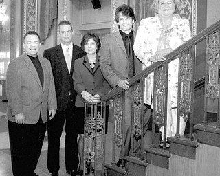 Special to The Vindicator
STEPPING UP: Among those participating in arrangements for the Symphony Ball on April 25 are, from left, Tim Smith of Smith and Co. Jewelers; Richard Keyse, ball committee chairman; Patti Smith, ball committee member; Randall Craig Fleischer, music director of Youngstown Symphony Orchestra; and Susan Berny, president of Youngstown Symphony Guild.