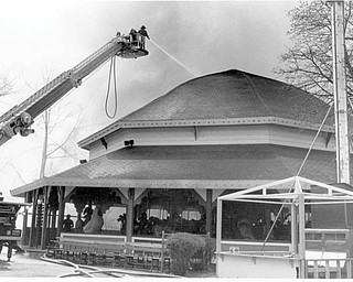 Areial Truck pours water on the roof of the carousel. Apr. 26, 1984