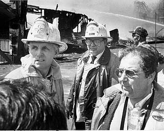 Apr. 26, 1984 Fire chief discusses strategy with assistant chiefs